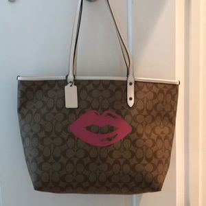 Brand new with msrp tag.  COACH Lips Bag